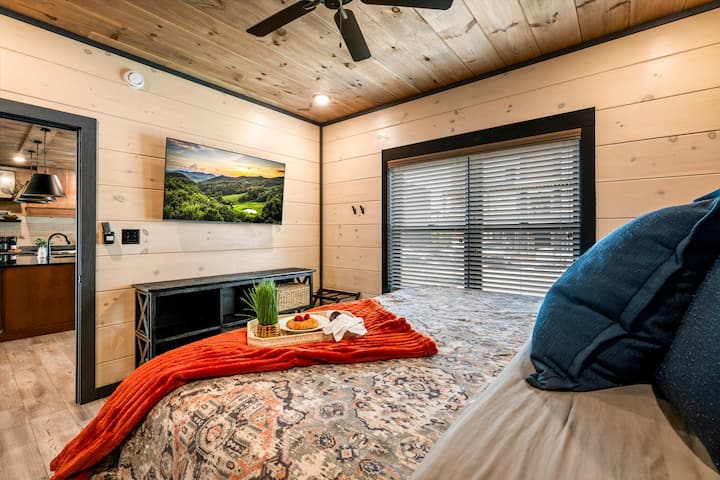 Bedroom #1 on the main living level features a king-size bed, ideal for guests who may have difficulty with stairs.