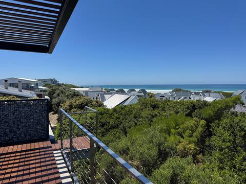 Modern beach house with 360 deg roof terrace view