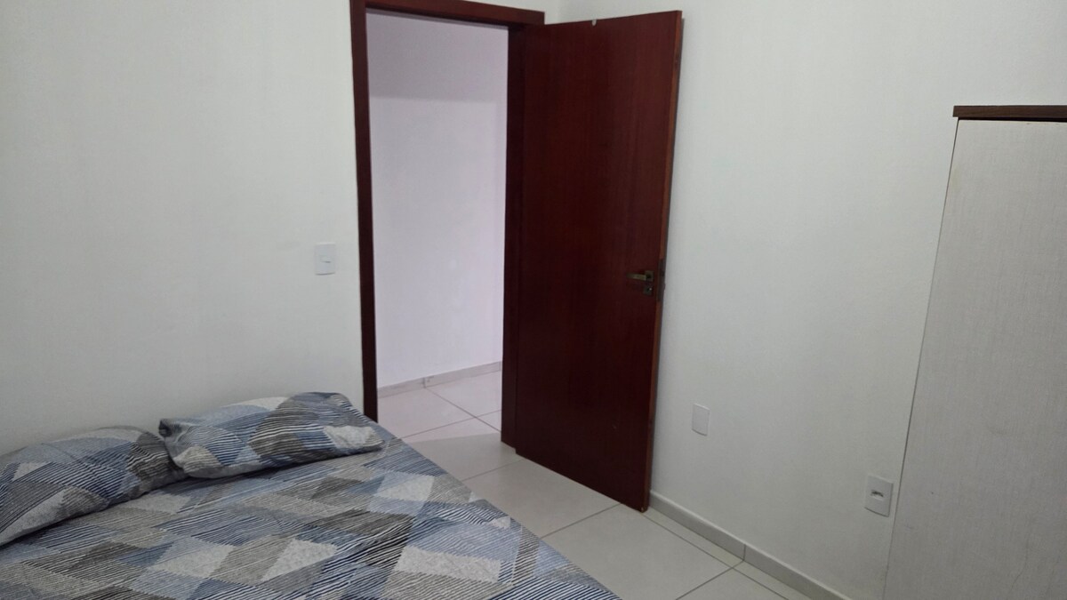 Slaapkamer II met een tweepersoonsbed