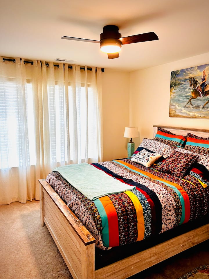 Luxurious MBR is on second floor. Shades plus curtains. Door knob lock. 