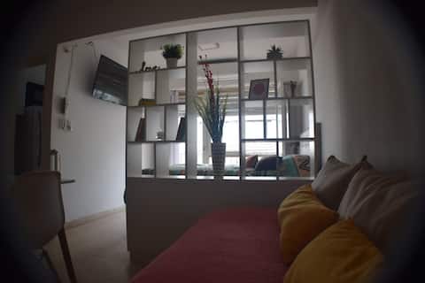 Popular Airbnb listing: Bright apartment meters from the sea in Area Centro