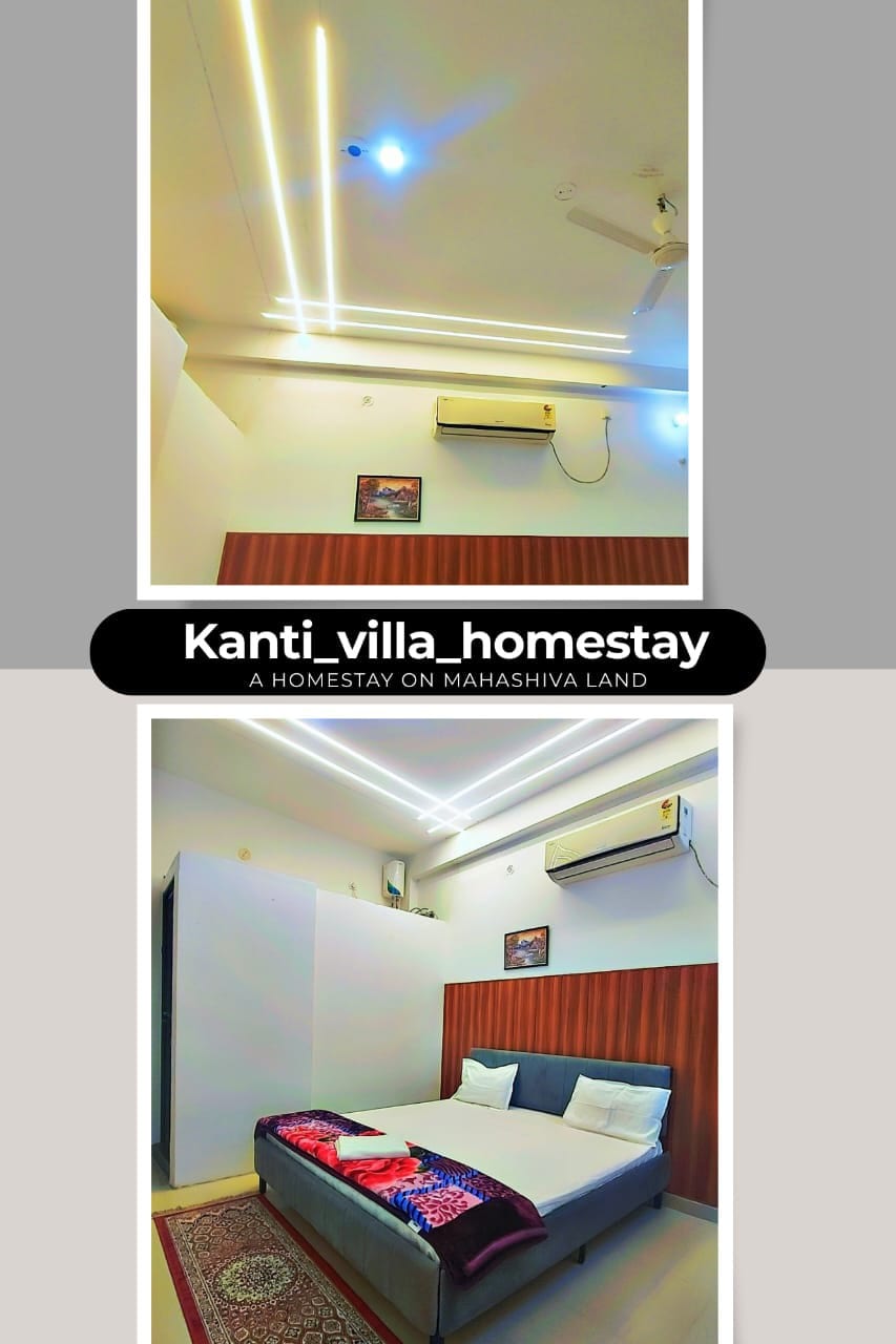 A modern room is featured with sleek ceiling lights illuminating the space. The room includes a spacious bed with a decorative blanket at the foot. An air conditioning unit is mounted on the wall, and a wall-mounted painting adds a touch of decor.