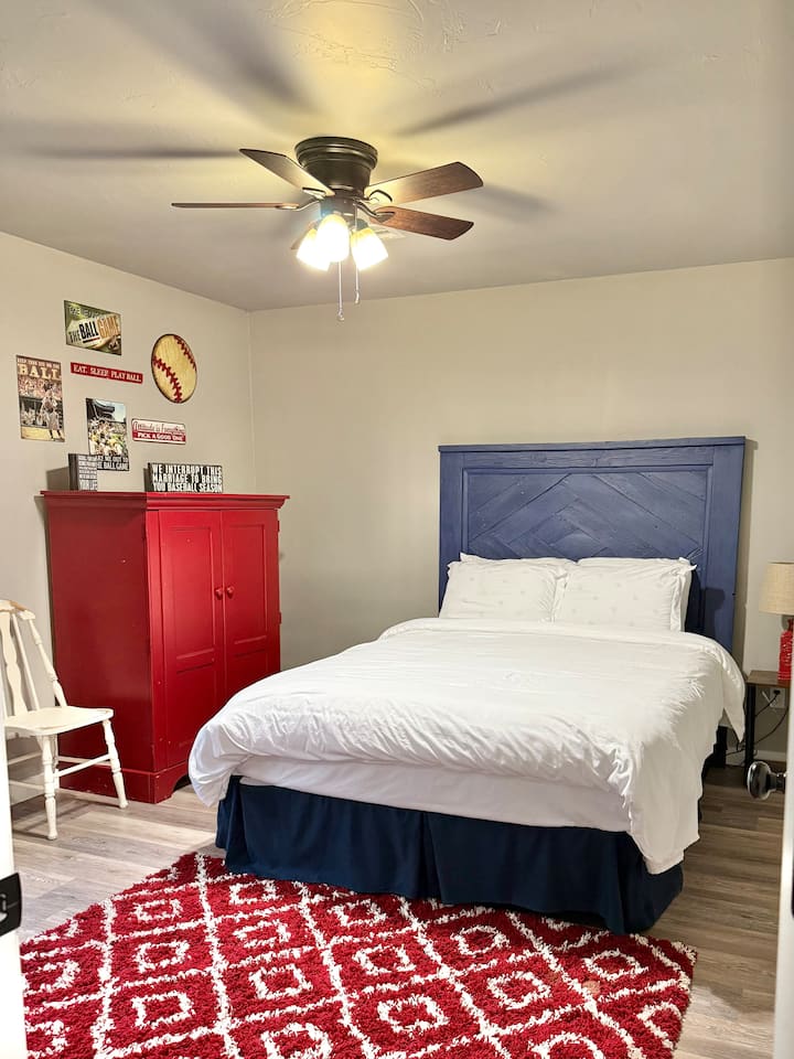 Cozy 3rd bedroom with queen bed and spacious closet.