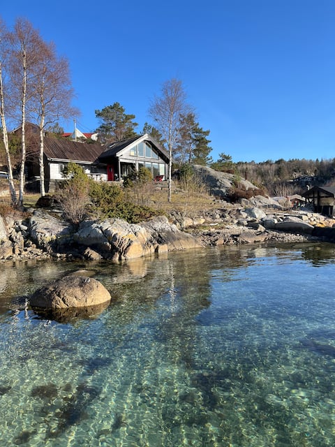 Cabin with private beach and jetty.
