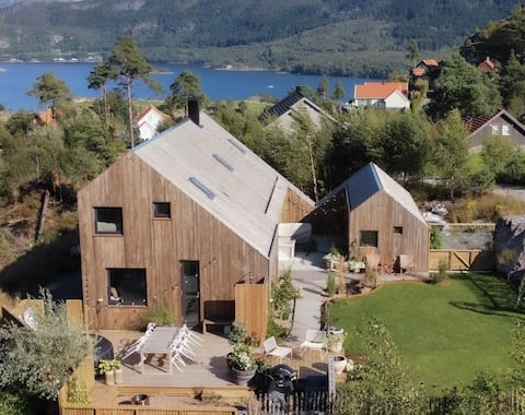 New architect-designed cabin. Boat included!