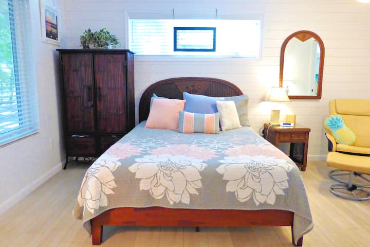 This Queen bed has an inflatable wedge for those who like a little elevation while sleeping.  The Armoire is a convenient way to store hanging clothes and the recliner allows for a little stretch while watching the Roku TV.
