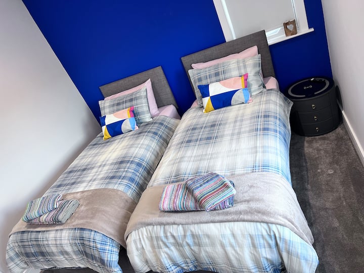 Bedroom 2: two single beds. You could push them together to make a Super King with single bed bedding.