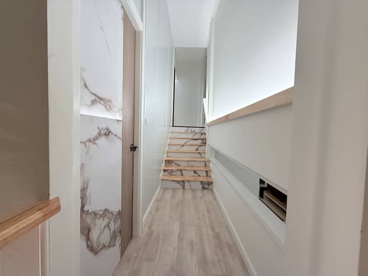 The bedroom entrance door on the 2nd floor is the first door on the left.