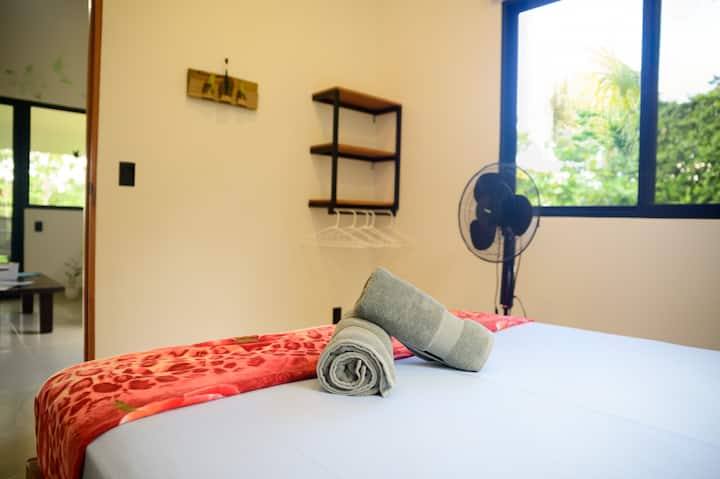 Unique decoration and space for your clothes in the bedroom add a stylish and practical touch