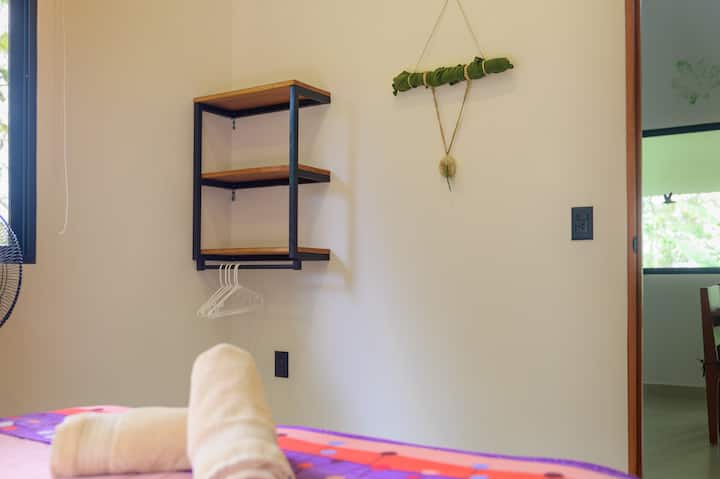 Subtle and tasteful decorations and spcae for your clothes in the bedroom