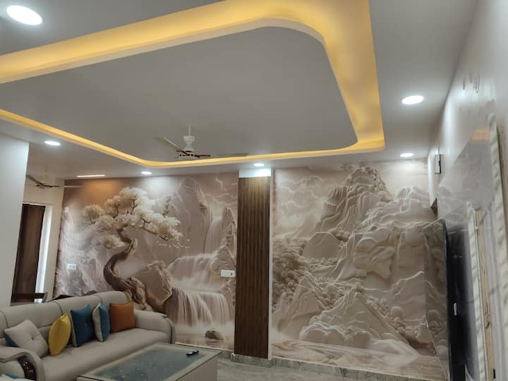 Luxusný salónik
️ Priestranná obývačka ako raj! Pôsobivá 3D tapeta, 6-miestna ultra pohodlná pohovka a 4-miestna jedálenská časť – ideálne na rodinné stretnutia alebo štýlovú zábavu. #LuxuryLiving #DesignerSpace