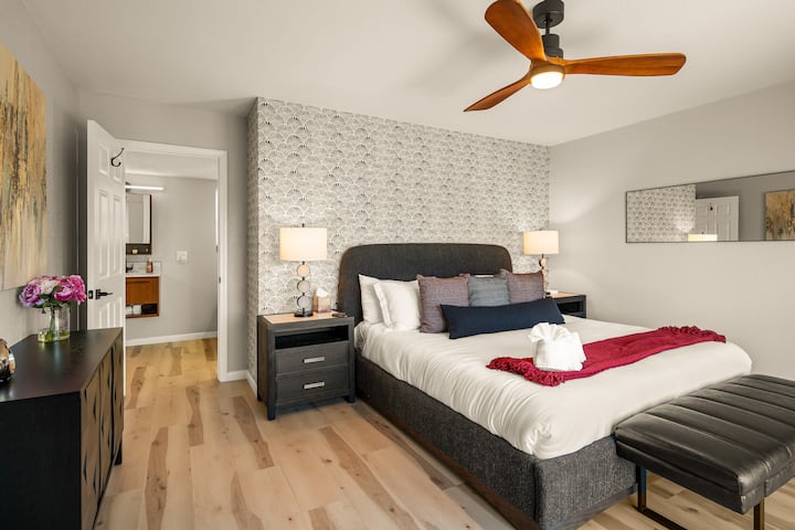 Primary bedroom with king bed, ensuite bathroom and private slider to the viewing deck.