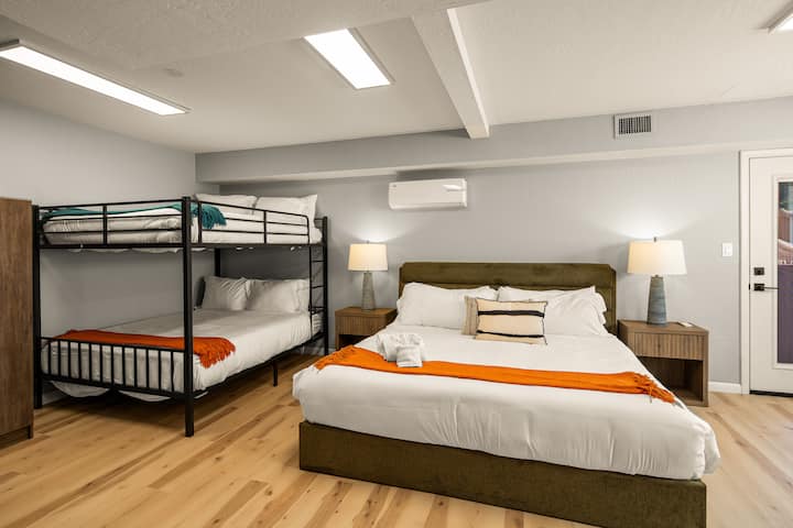 King bed and double Queens bunk bed. Private door leads out to the hammocks and pool area.