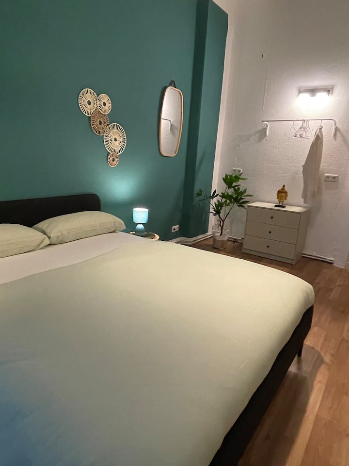 A double bed (1.80 m x 2 m) in stylish design with comfortable mattress as well as hotel quality blankets, pillows and bed linen – for 2 people; daylight can be darkened by blinds, with large dresser and separate dressing table with mirror.