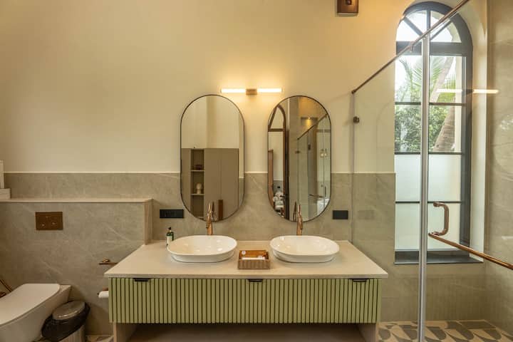 Our beautifully finished bathroom offers hot water, complimentary toiletries, and modern fixtures, ensuring a refreshing experience throughout your Goa vacation.