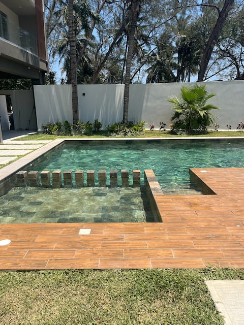 Modern Apartment in front of the Sea 2BD*2BDR*Wifi*Pool