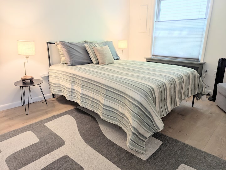 Spacious room with two large windows