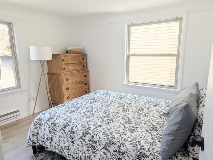 Two large windows and tons of shelf space in the closet