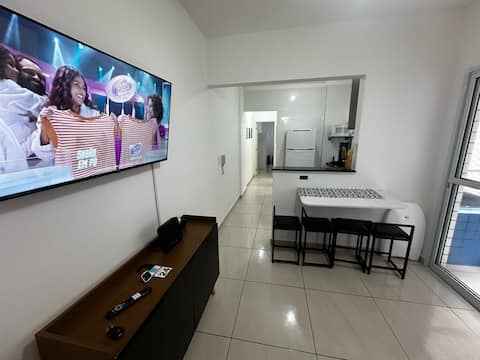 Top Airbnb: New apartment, 20 meters from the beach, with garage, and wi-fi. in Praia Grande