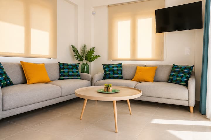Each Villa - Ground Floor - Bright open-plan living area with direct access to the pool terrace