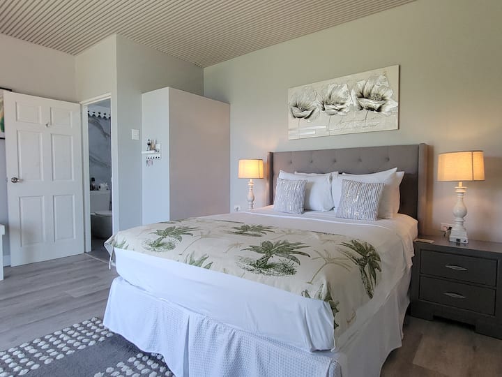 Upstairs Master ensuite bedroom with sea view