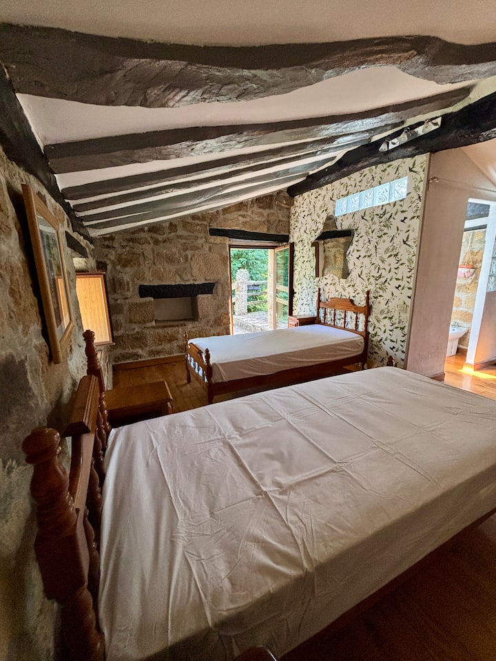 Chambre avec deux lits de 90 cm