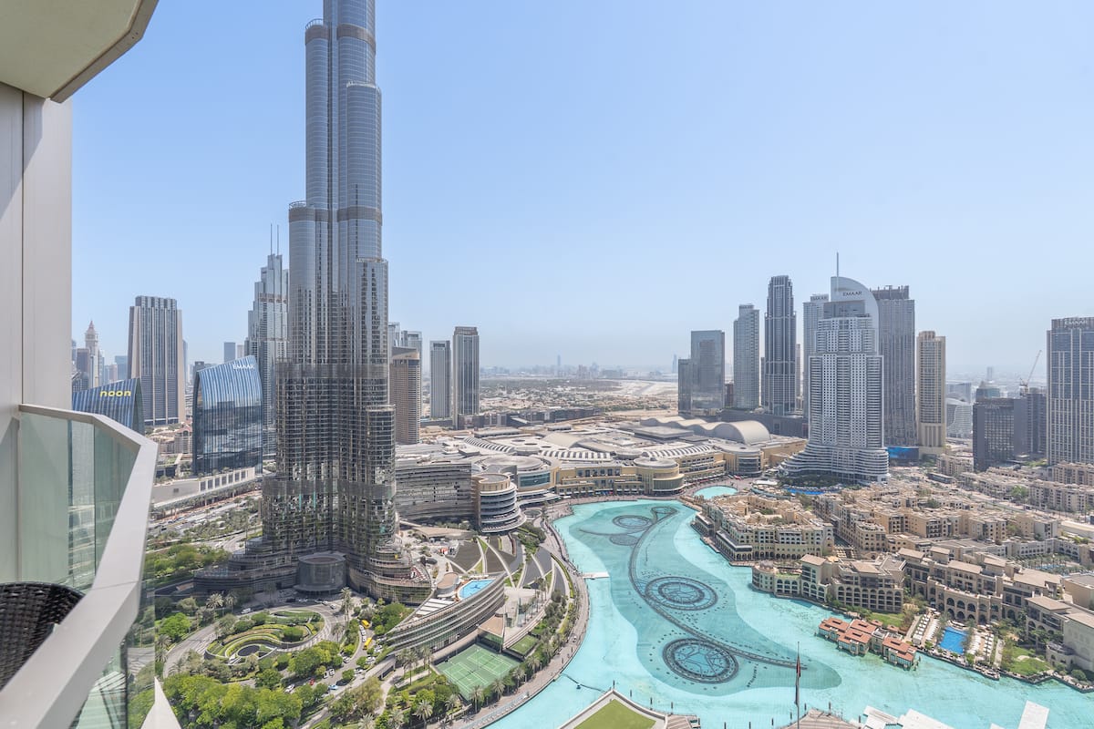 Burj Khalifa and the Dubai Fountain lake from the balcony of our 3-bedroom that sleeps 10