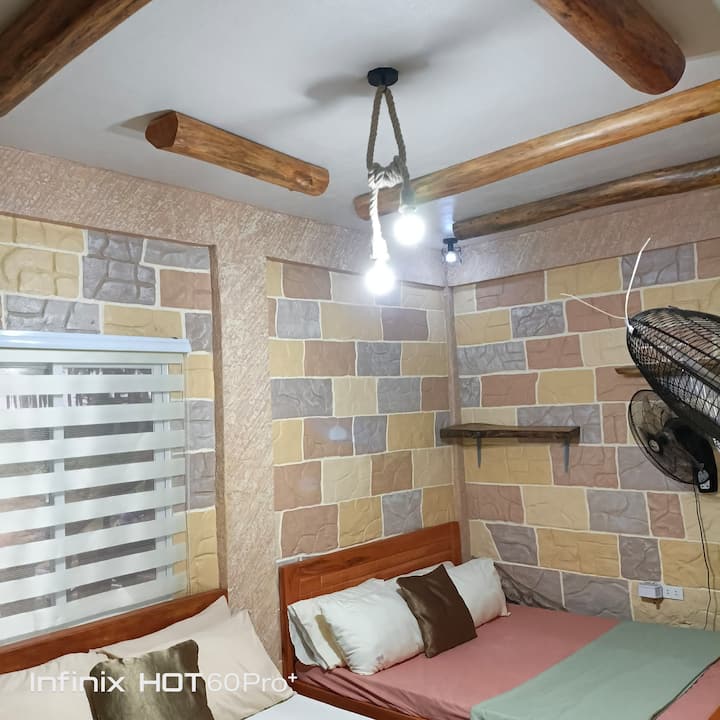 Has its own private bathroom, aircon, electric fans, smoke alarm, backdoor and balcony. 