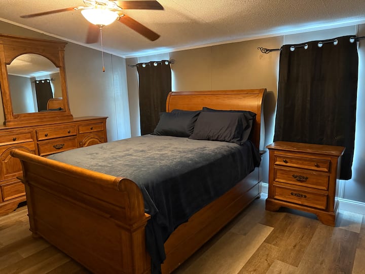 Queen size bed with extra pillows