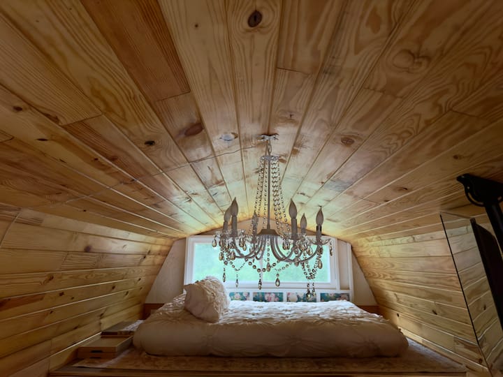 Main loft measurements:
9'3" wide
6'7" deep
4’2” height at center
3’1” height at the top of each side 
Floor space is 30 sq. ft.
2,400 lb. weight limit