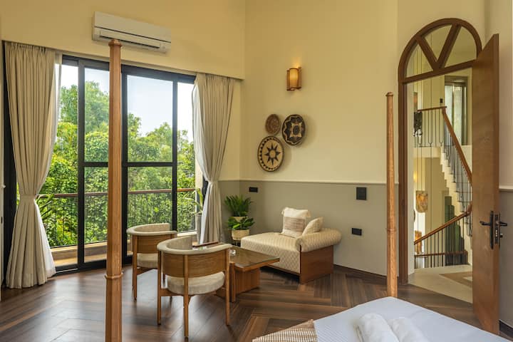 Your private sanctuary features a luxurious king-size bed, ensuite bathroom, AC, and safe, offering everything you need for a relaxing Goa vacation.