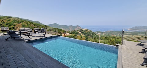Stunning villa heated infinity pool & sea view