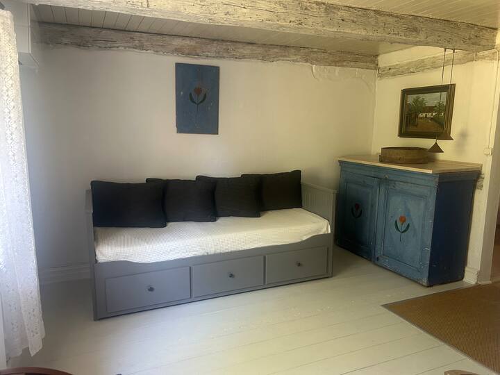 Habitación de paso con sofá para 2 personas