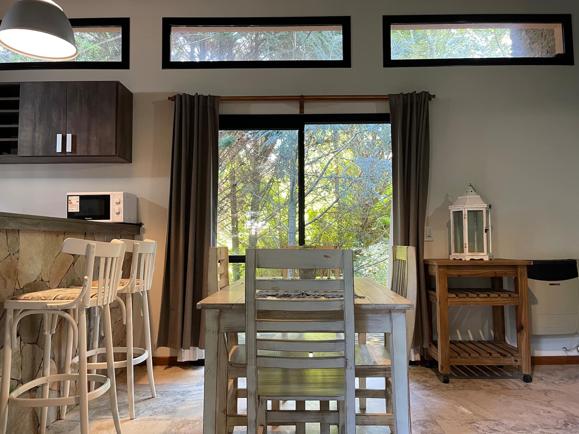 A home with a forest and beach