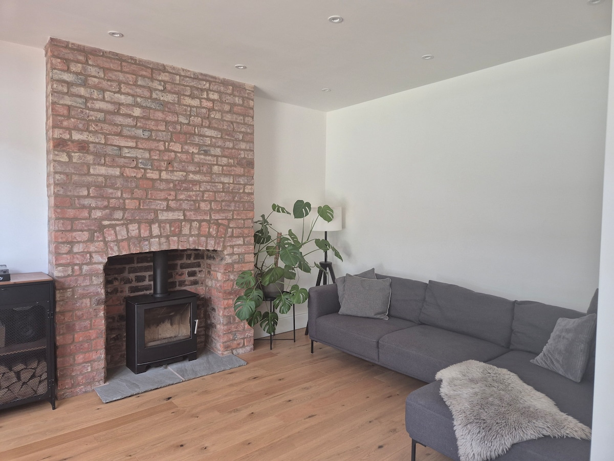 Open plan family room with corner sofa