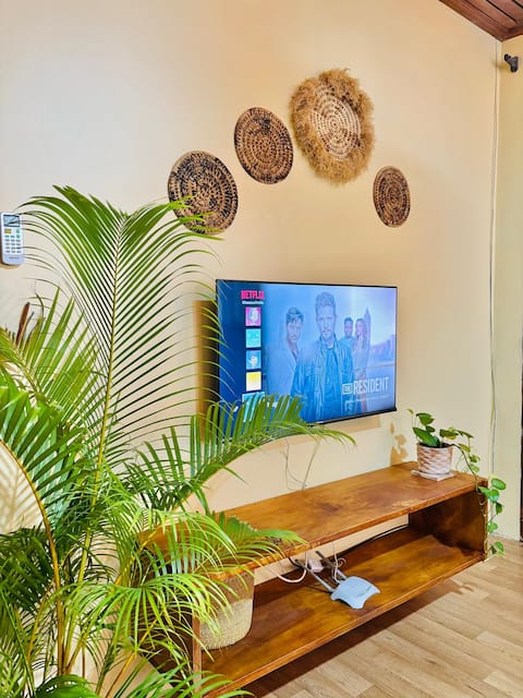 Minzi Homes | Cozy Green Escape with balcony views