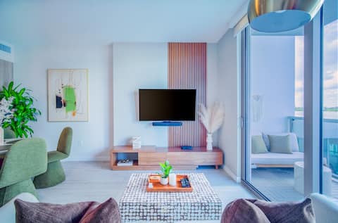 Top Airbnb: Design District Retreat | Workspace, Pool & Gym in Baypoint