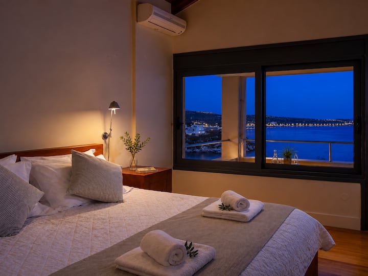 First Floor - Bedroom 3 – Queen-size bed, en-suite bathroom and private balcony with beautiful sea views.