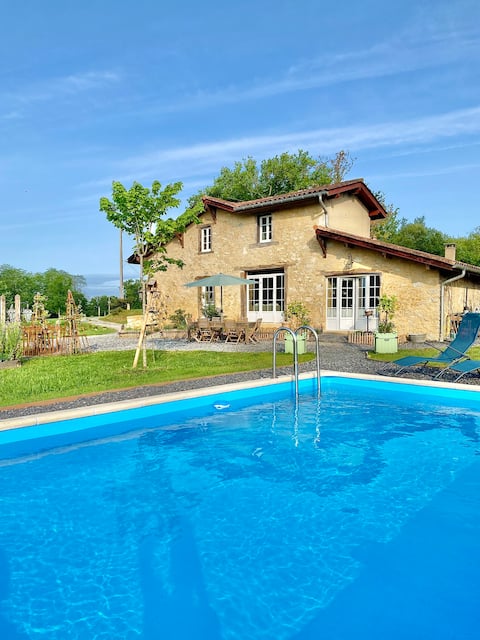 Beautiful farmhouse with pool and wooded park