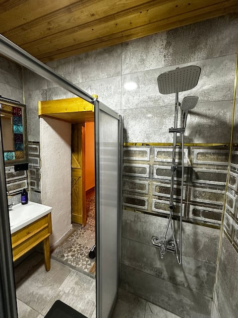 Historical Stone House with Cave View