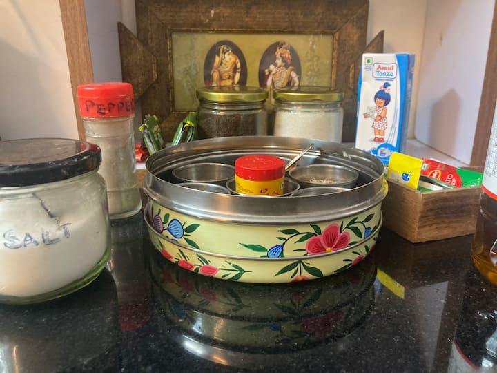 Tea ,coffee, sugar,milk for a perfect start to a beautiful day. Basic spices and condiments for a quick start. You can always get more ingredients to cook your home style meals