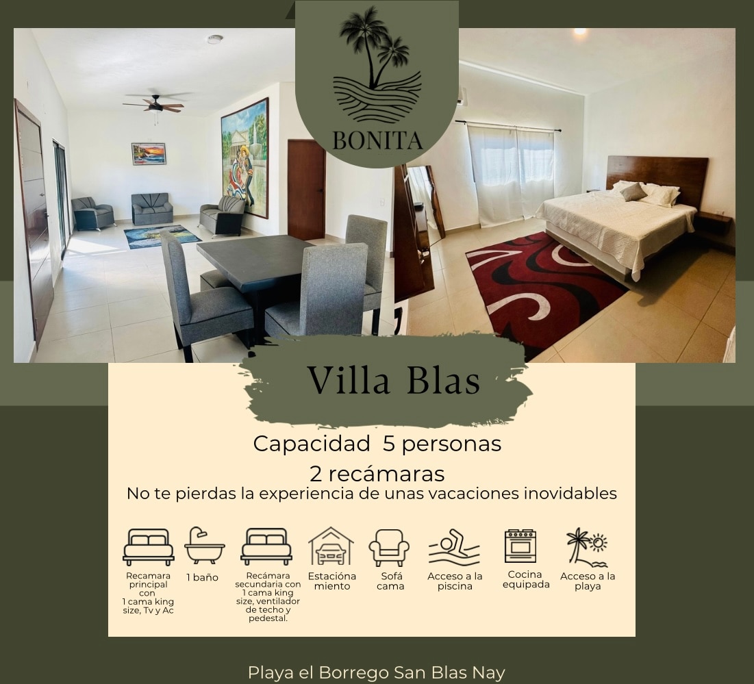An inviting space is presented with a spacious room featuring a sofa bed and an oversized mural. A king-sized bed with soft linens is placed in the corner. Natural light fills the area through a large window, complemented by a ceiling fan for comfort.