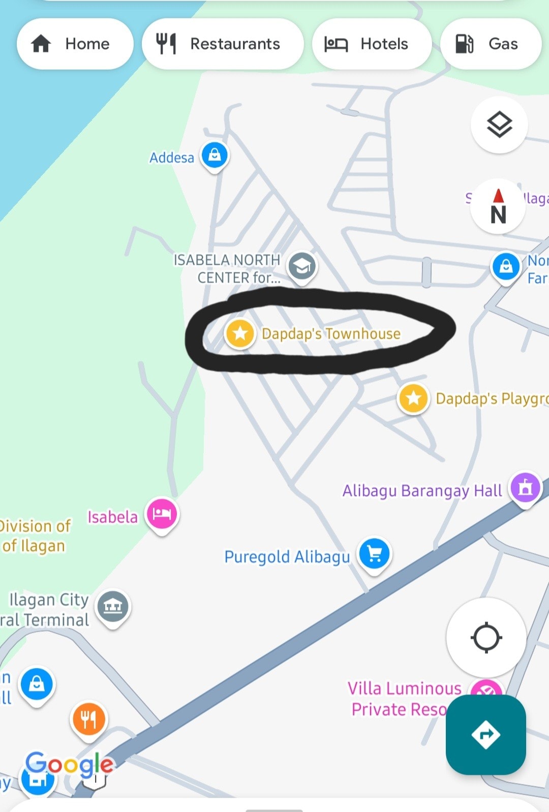 A map highlighting Dapdap's Townhouse, with nearby landmarks such as Isabela North Center and Puregold indicated. Surrounding areas and points of interest are marked for reference, demonstrating convenient access to local amenities and attractions.