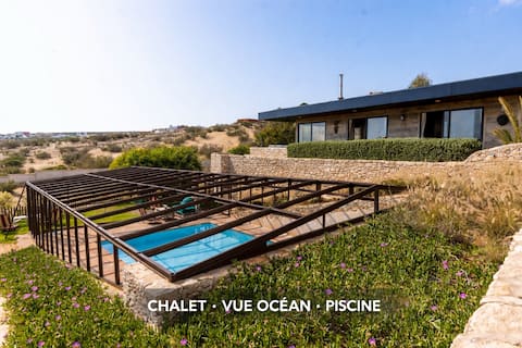 Wooden chalet with ocean view and pool