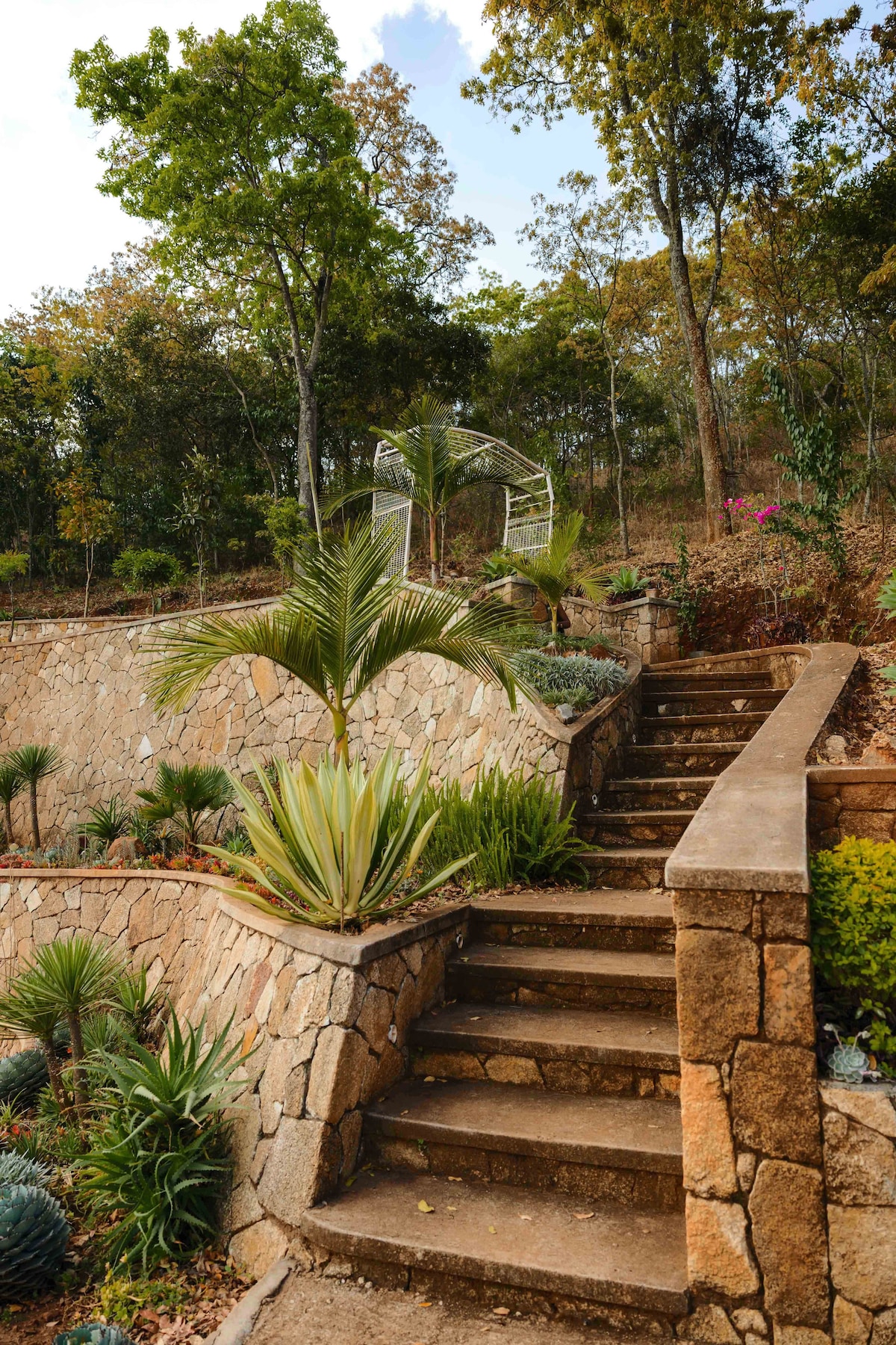 The Nest — Natural stone stairs leading to apartment