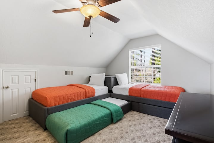 Up the back stairs, hidden away from the hubbub is a perfect teen (or introvert) retreat! Cool spaces, TV for movies, and a private bath! They'll love it!