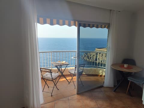 The balcony overlooking the sea.