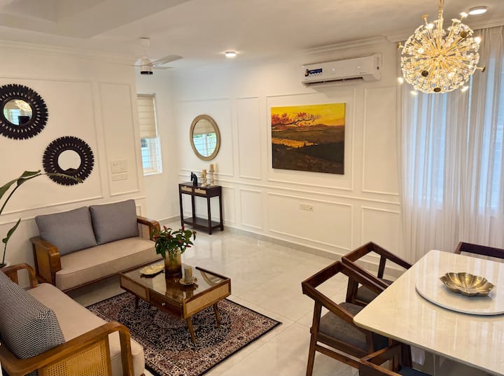 The inviting living room is, a subtle invitation to pause, to feel, and to reflect.