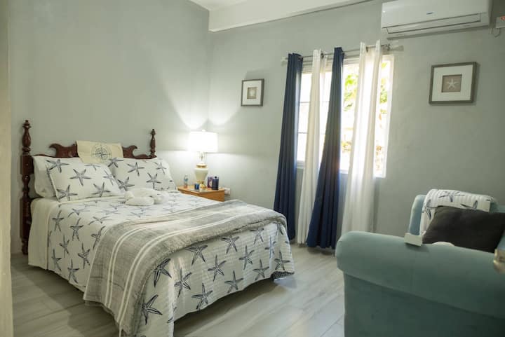 Get a great night's sleep in Bedroom 3, outfitted with a cozy Queen bed, air conditioner, and fresh, clean linens.