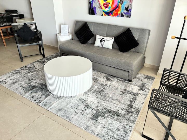 Spacious living room with pull out couch